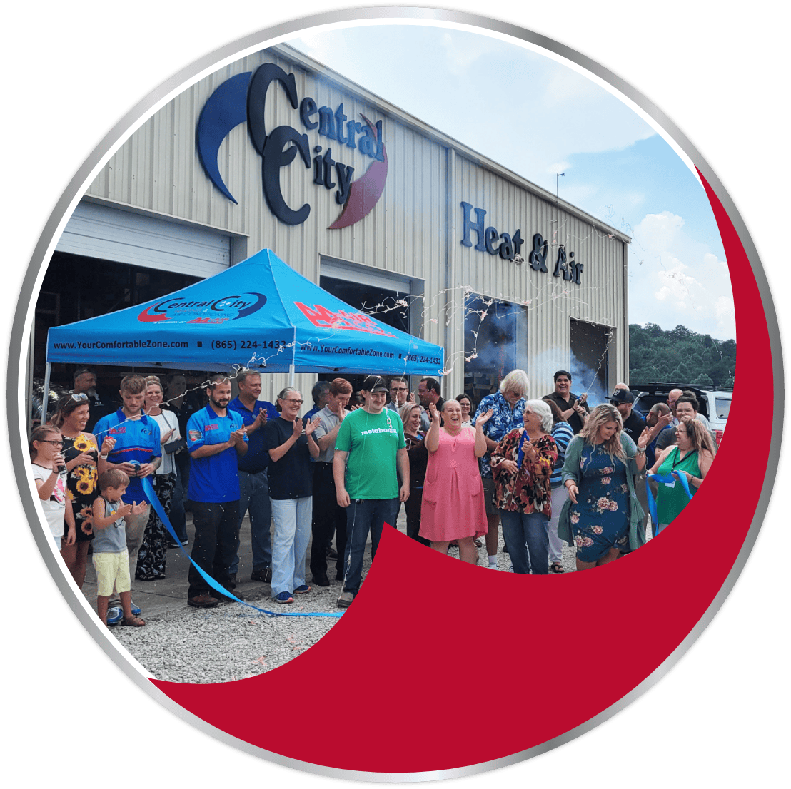 Central Heating & Air Conditioning team celebrating 50 years in the HVAC industry at their office in Kingston, Tennessee.